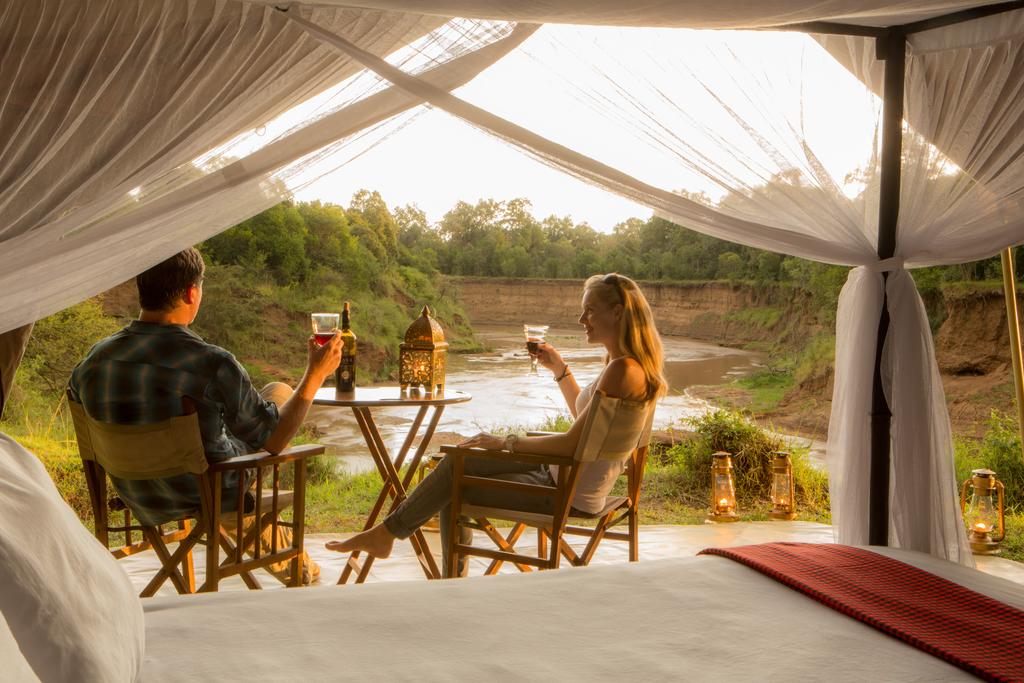 a couple getting a drink enjoying tanzania wedding package