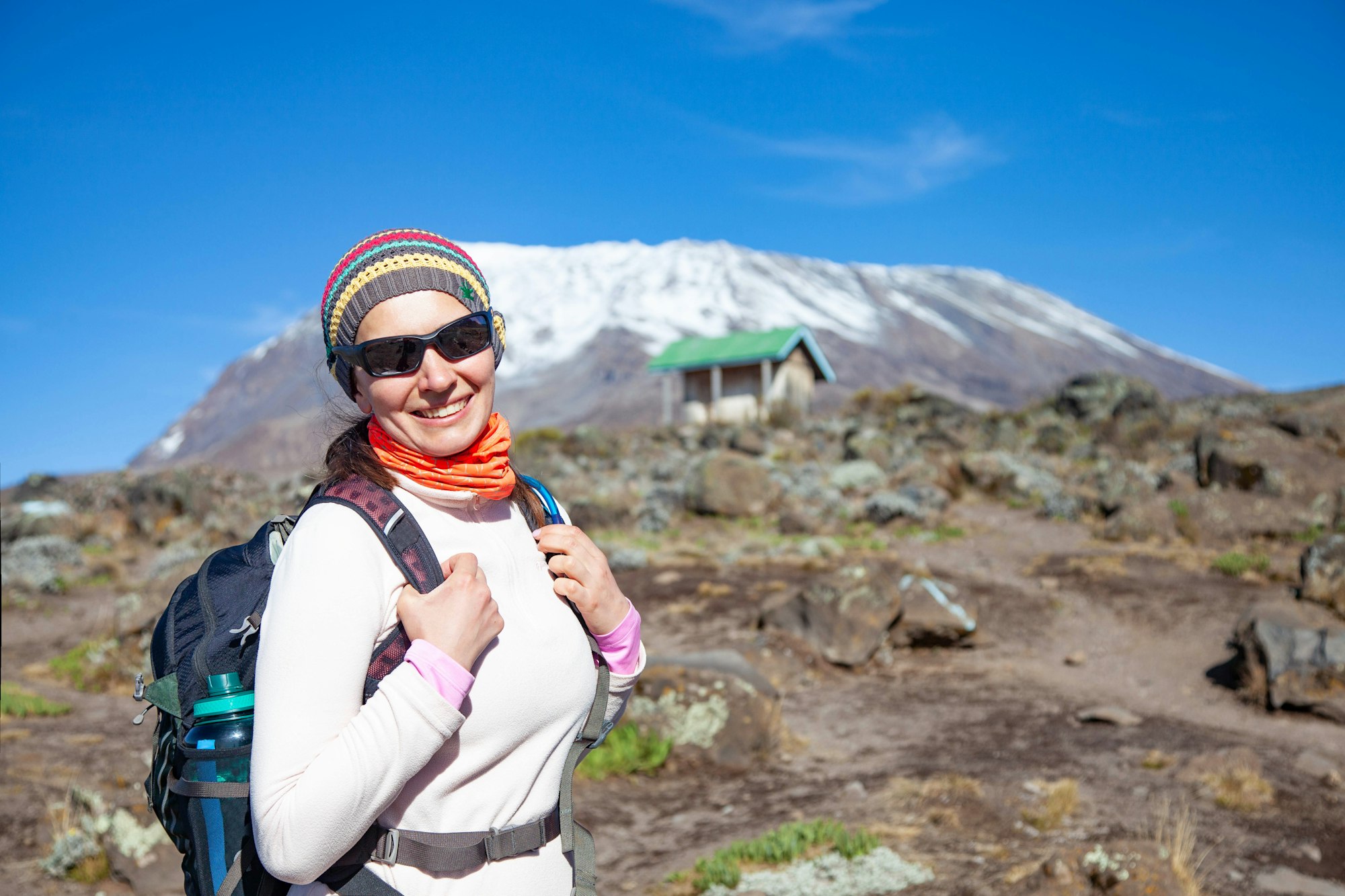 Female backpacker on the trek to Kilimanjaro mountain