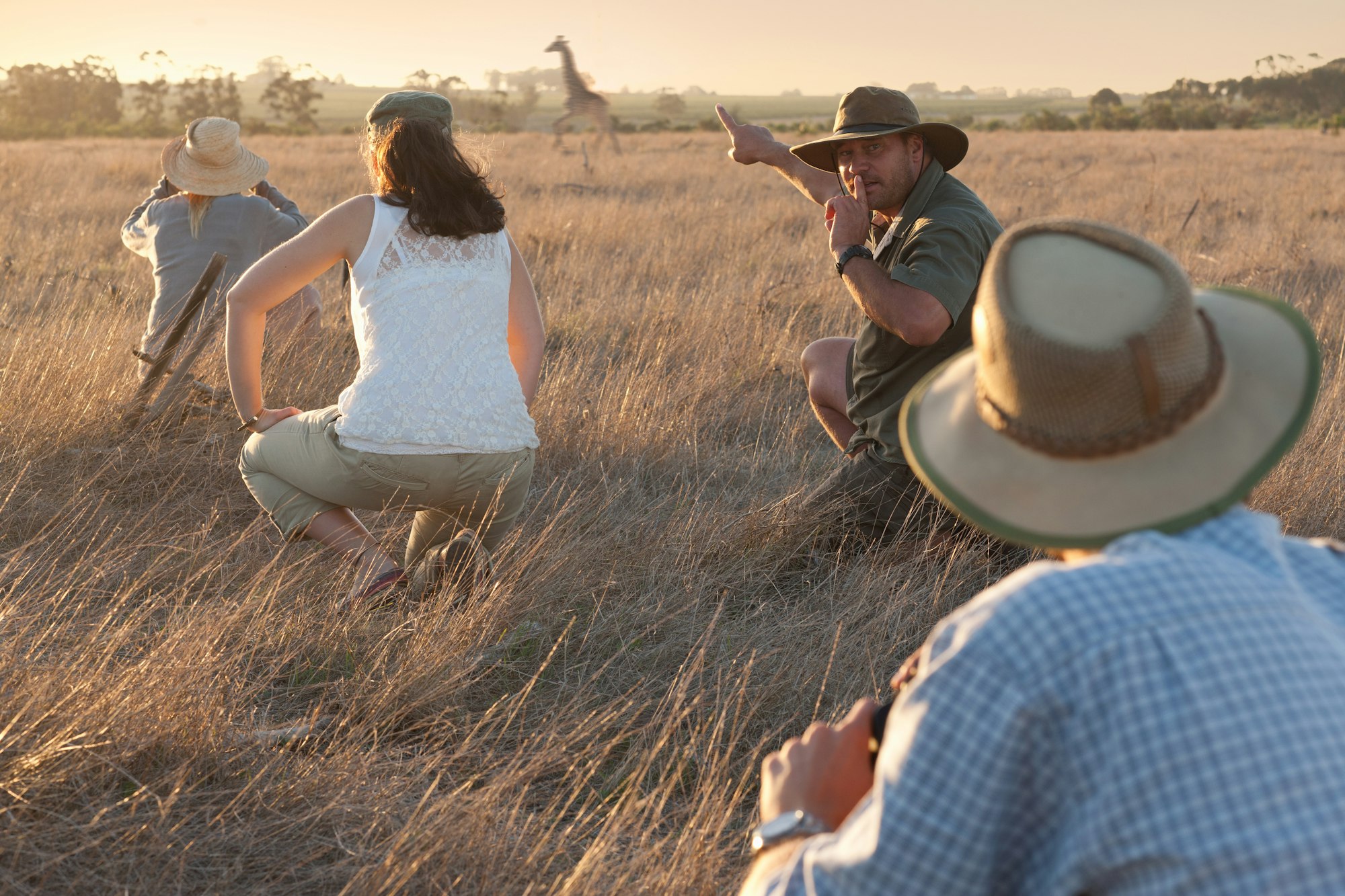 Guests exploring the Tanzanian bush on foot with a safari guide