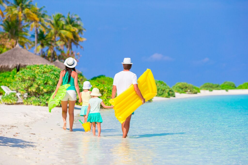 Young family on beach vacation