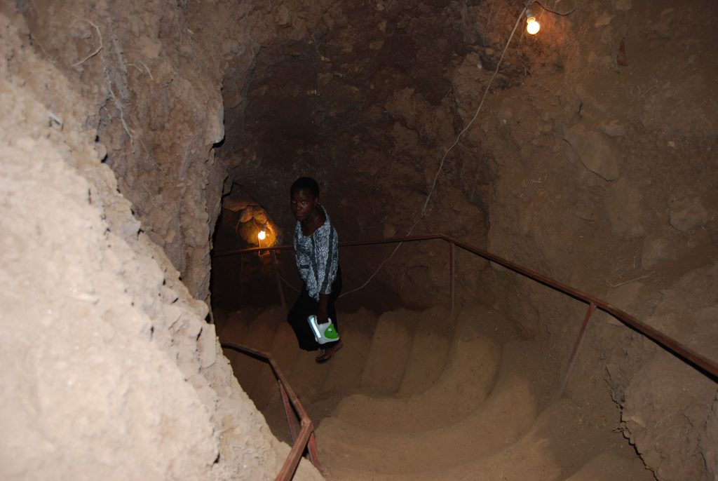 The entrance to a Chagga cave, showcasing the historical and cultural significance of the Chagga people