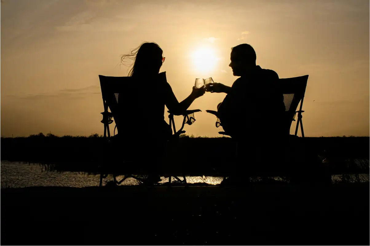 Couple on honeymoon safari in Tanzania’s Ngorongoro Crater with elephants