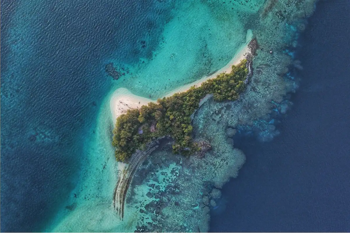 Aerial view of Mnemba Atoll and Matemwe’s pristine reef