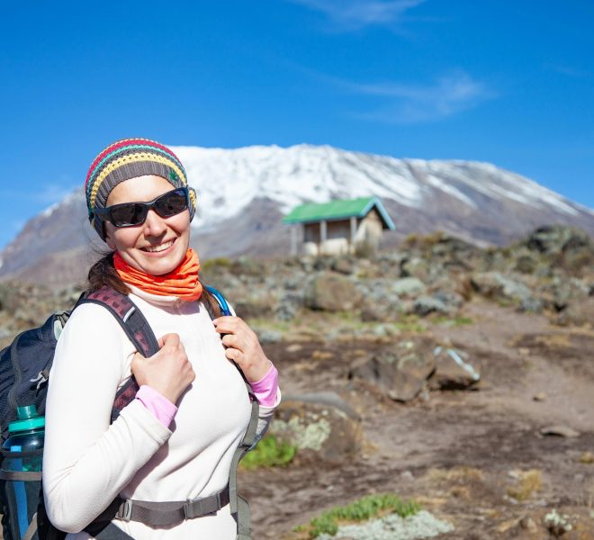 Female backpacker on the trek to Kilimanjaro mountain